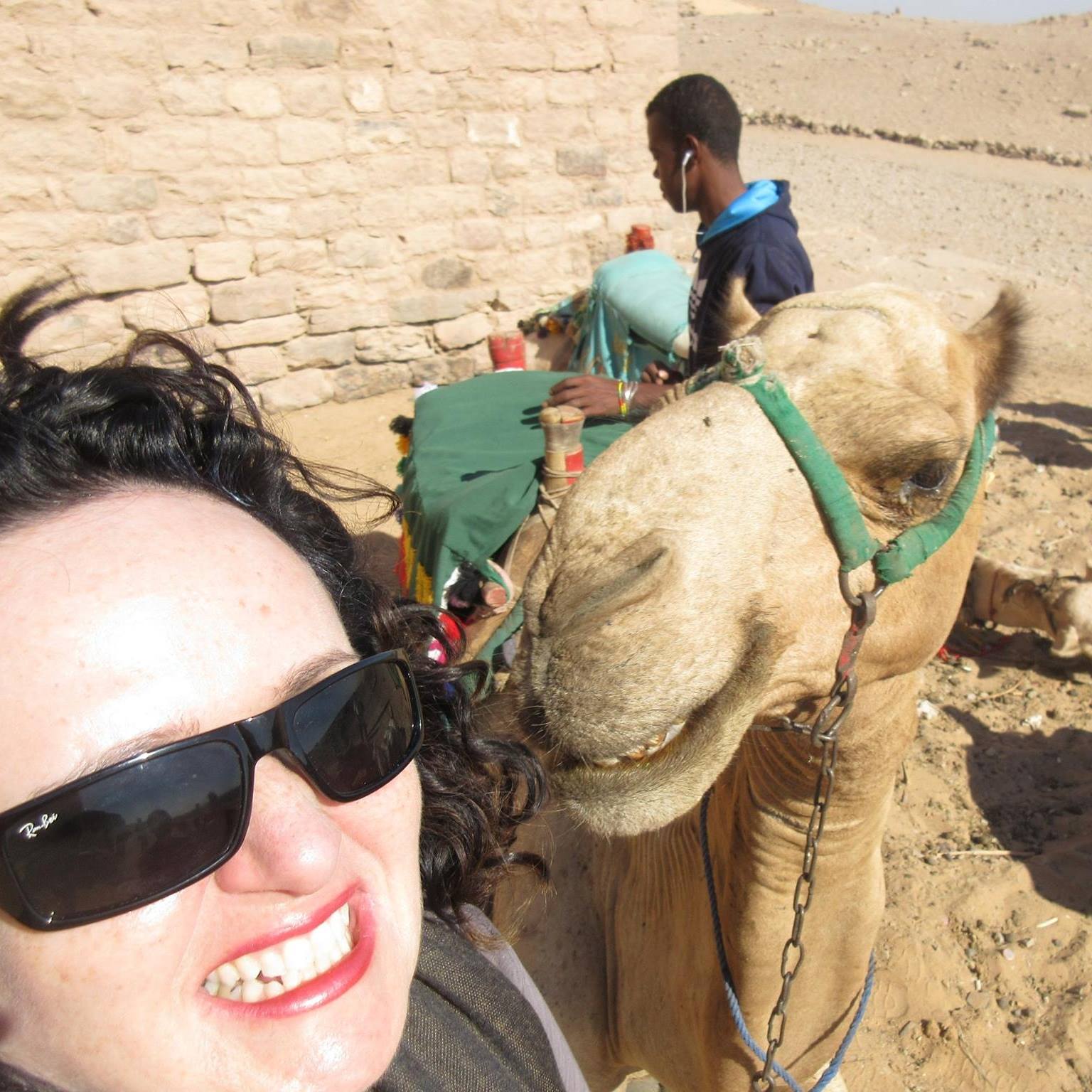 Camel and laura Laura in Egypt with a Camel and locals